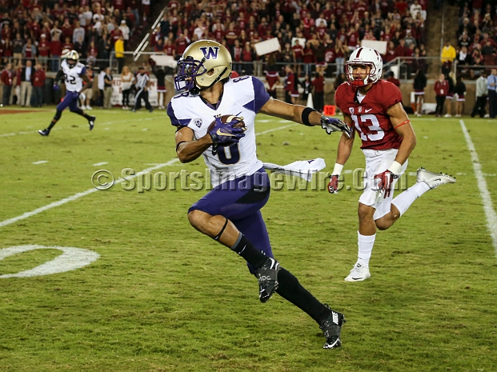 2015StanWash-067.JPG - Oct 24, 2015; Stanford, CA, USA; Washington Huskies wide receiver Dante Pettis (8) catches a 33 yards pass in the fourth quarter against the Stanford Cardinal at Stanford Stadium. Stanford beat Washington 31-14.